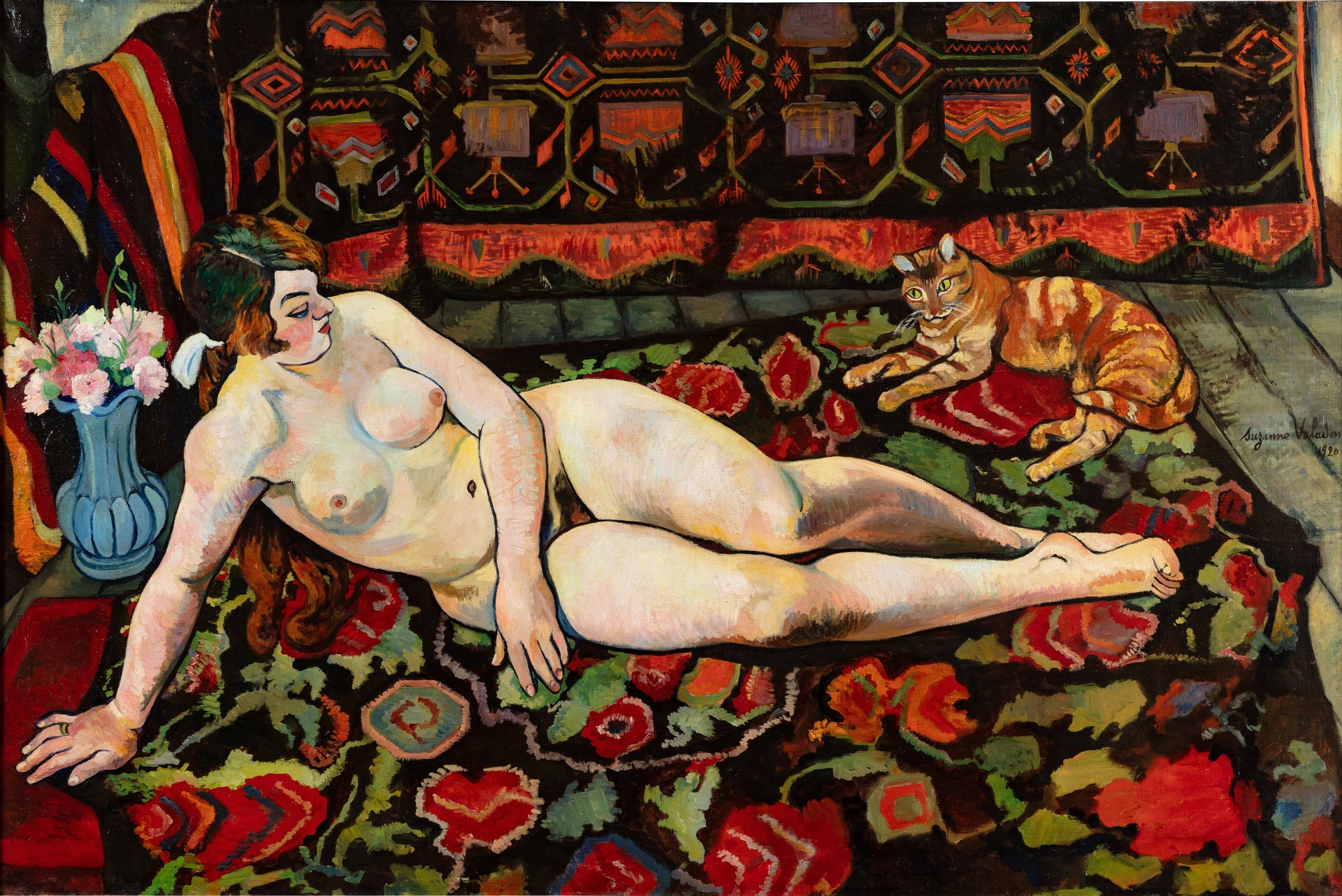 Nu au chat, allongé sur une draperie à fleurs — Suzanne Valadon