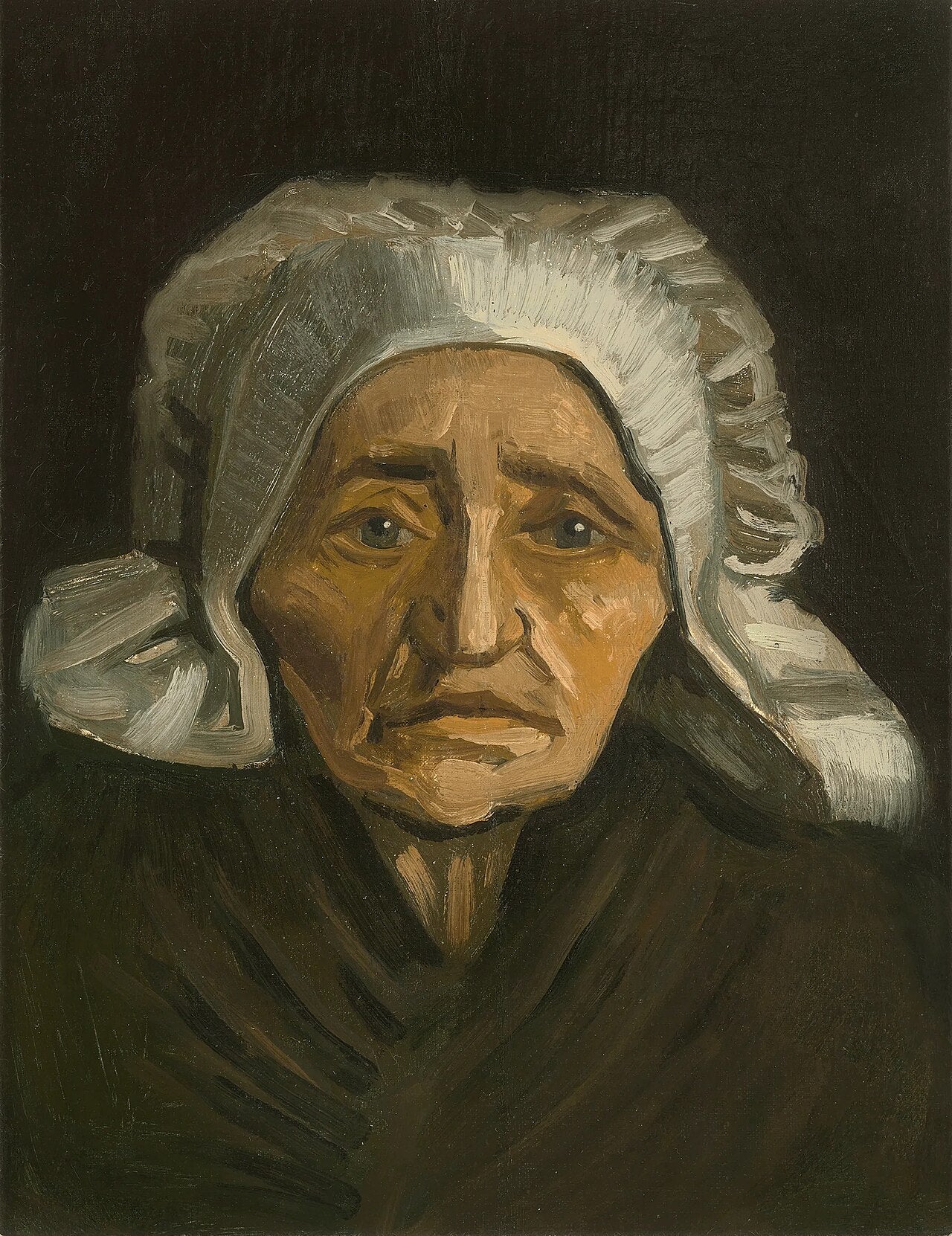 👵 白い帽子をかぶった農婦の頭部 – ヴィンセント・ヴァン・ゴッホ (1884)