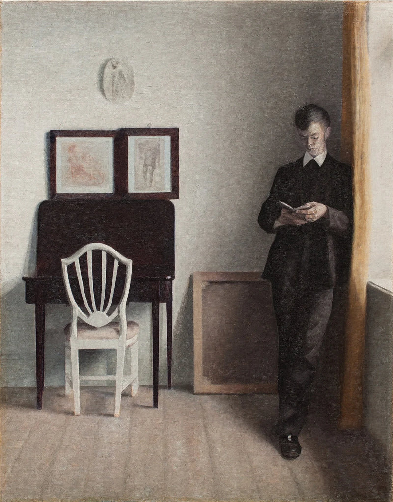 Intérieur avec un jeune homme lisant - Vilhelm Hammershøi